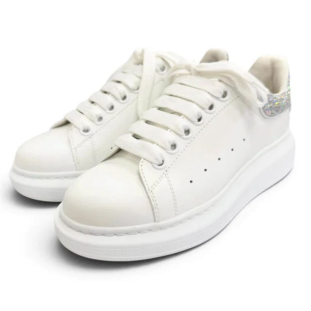 Alexander McQueen LARRY Leather Sneakers in Leather from LuxUness