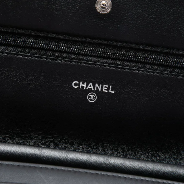 Black Chanel CC Embossed Lambskin Camellia Wallet On Chain Crossbody Bag in Black Lambskin from Designer Revival, photo 2 of 2