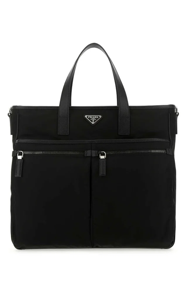 Prada Recycled Nylon And Leather Top Handle Bag — Black Poliammidericiclata-vitello in Black Nylon from HEWI