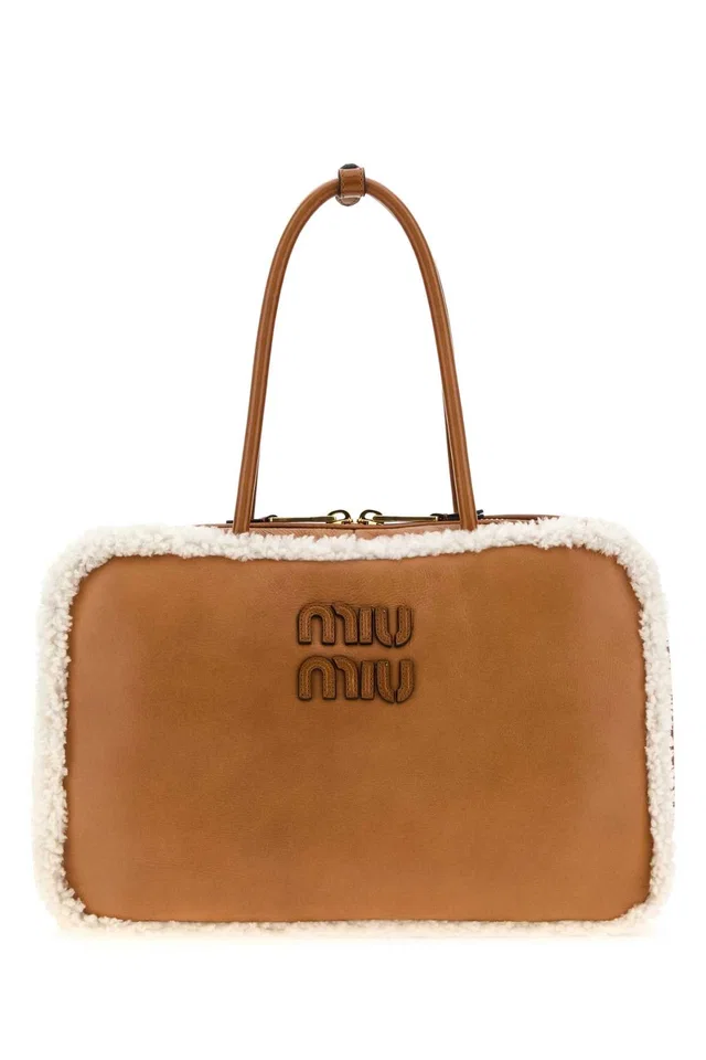 Miu Miu Sheepskin-Trimmed Leather Shoulder Bag — Brown Ovisariesaries in Brown Leather from HEWI