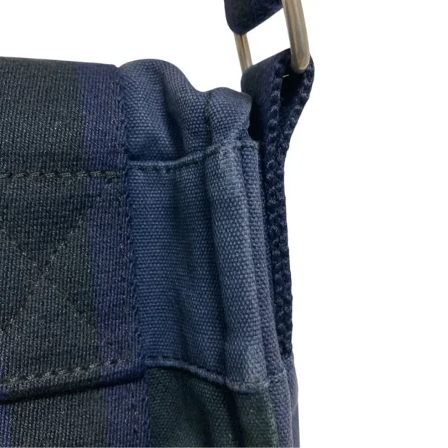Hermès Fourre Tout Basace PM Canvas Shoulder Bag in Black Canvas from LuxUness, photo 13 of 14