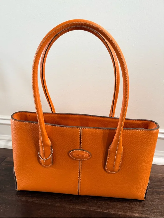 Tod's (Fake) Orange Pebbled Leather Double-Handle Shoulder Bag in orange Leather from Poshmark