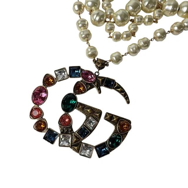 Gucci GG Logo Necklace Faux Pearl Color Stone from The Reluxe