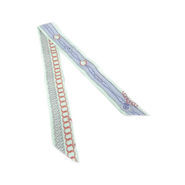 Hermès Maillons Twilly Scarf in Silk from The Reluxe