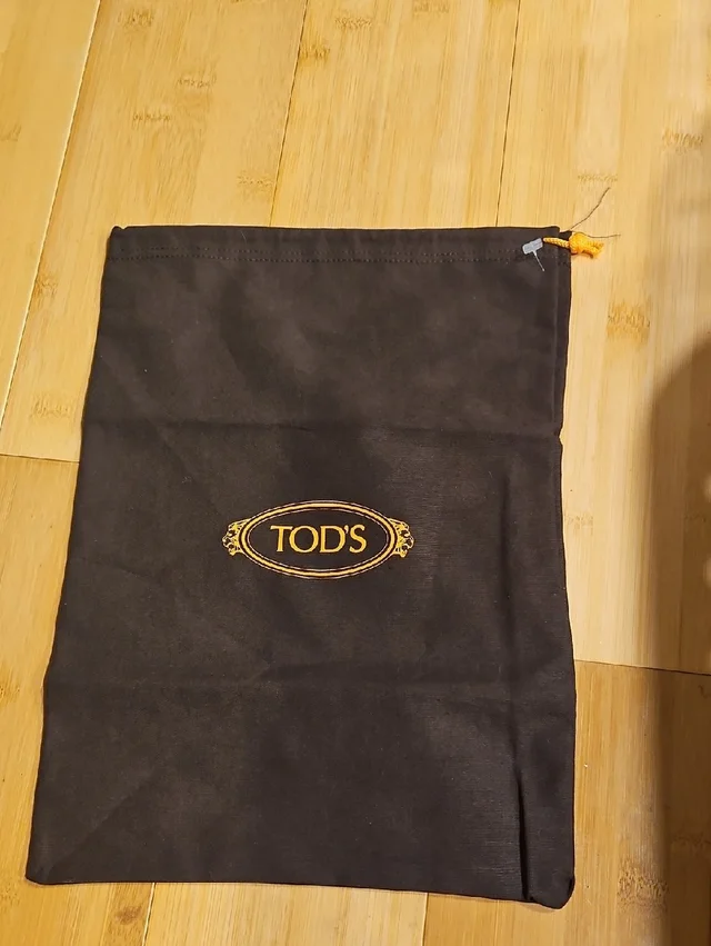 Tod's Dust Bag in brown|red from Poshmark, photo 1 of 1