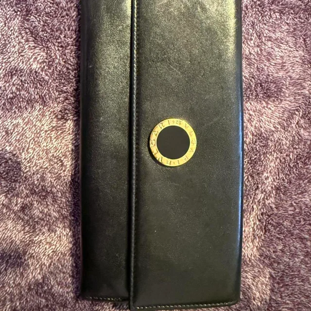 Bvlgari Women's Wallets - Black in black Leather from Depop, photo 1 of 1