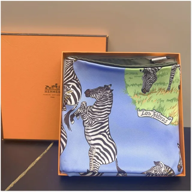 Hermès Light Blue Les Zèbres Silk Scarf 90 in Blue Silk from Luxury Promise, photo 1 of 1