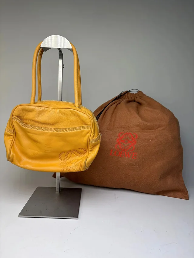 Loewe Vintage Leather Handbag Yellow Gold-Tone Zip in yellow Leather from Grailed, photo 1 of 1