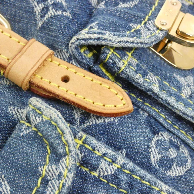 Louis Vuitton Monogram Denim Backpack in Blue Denim from LuxUness, photo 4 of 9