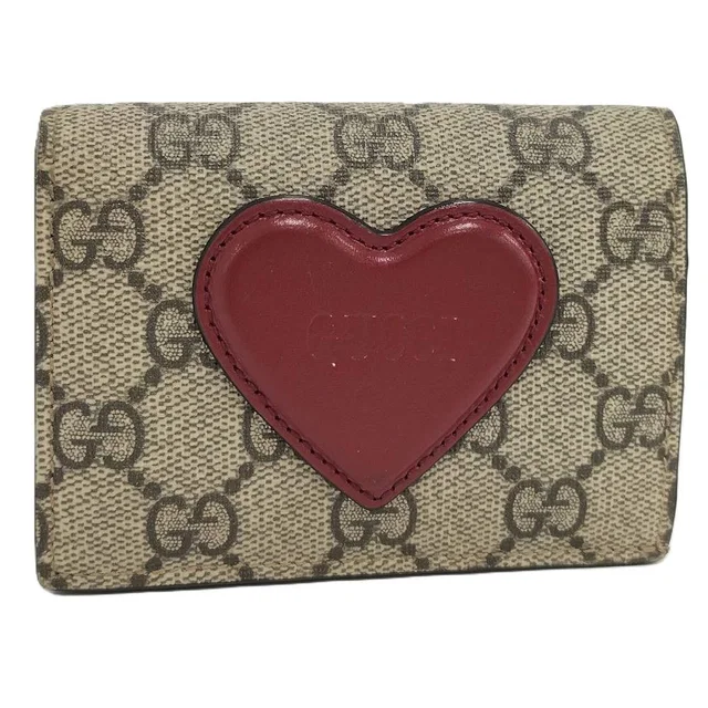 Gucci Heart Logo GG Supreme Bifold Wallet from The Reluxe