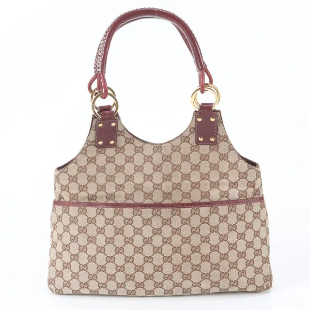 Gucci GG Canvas Leather Tote Bag Shoulder Hand Gold in Gold Canvas from The Reluxe