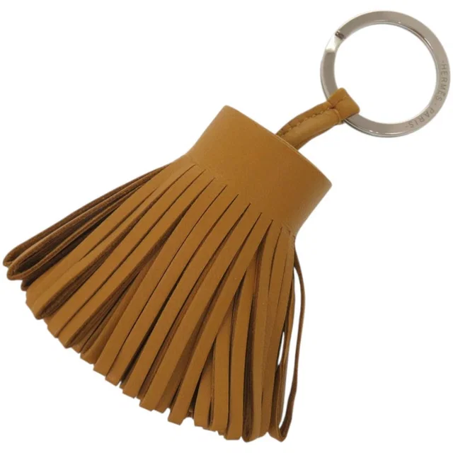 Hermès Bag Charm Fringe Key Holder Agneau Milo Sesame Brown Carmen in Brown from The Reluxe