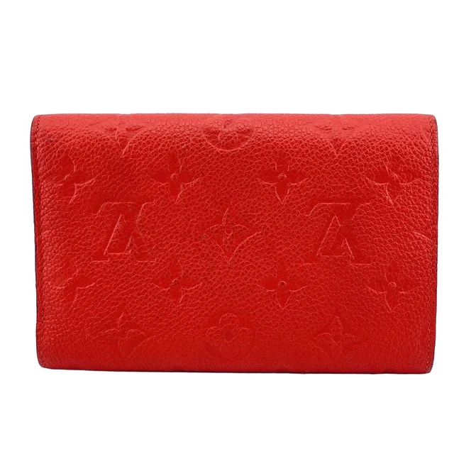Louis Vuitton Portefeuille Curieuse Monogram Empreinte Red Trifold Wallet in Red from The Reluxe