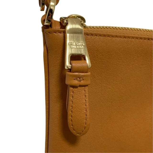 Prada Triangle Plate Soft Grain Leather Shoulder Bag in Brown Leather from LuxUness, photo 9 of 16