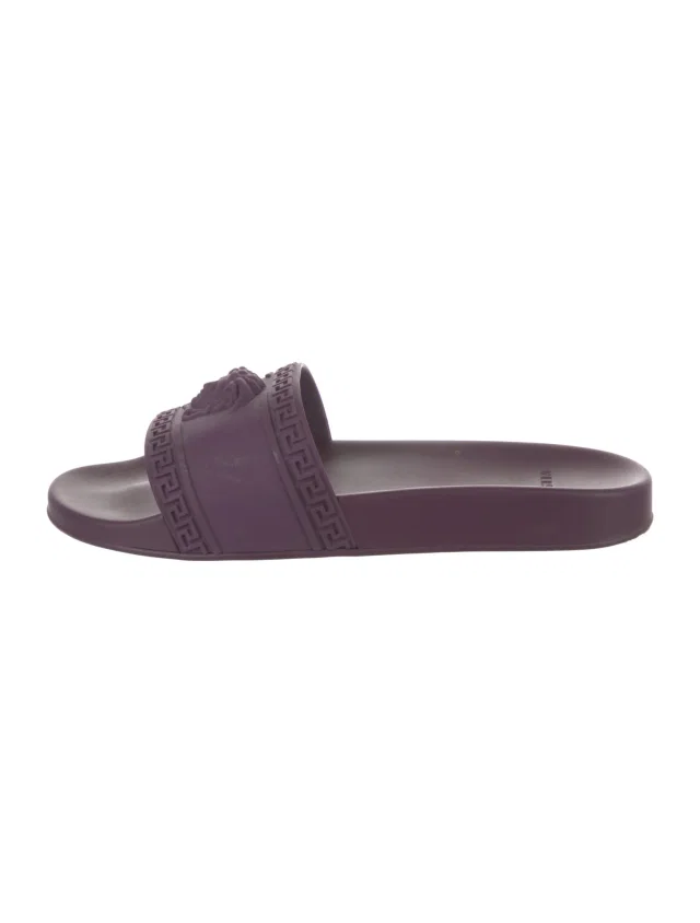 Versace Grecca Pattern Rubber Slides in purple from The RealReal