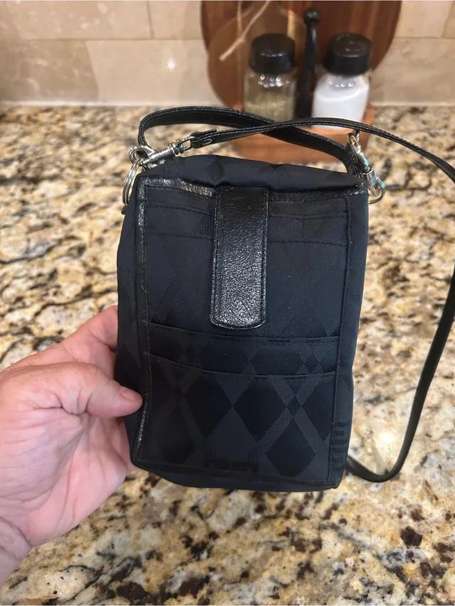 Givenchy Logo Essential Mini Crossbody Bag in black from Poshmark, photo 1 of 1