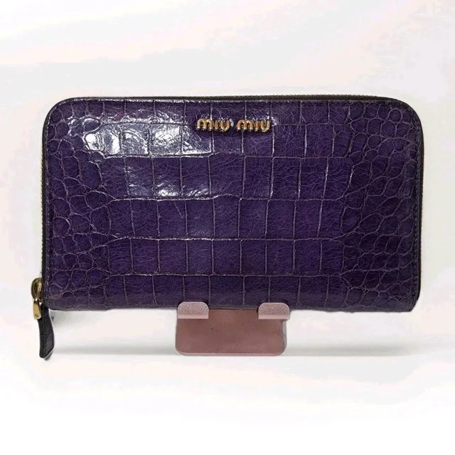 Miu Miu Women's Wallet - Purple in purple from Depop, photo 1 of 1