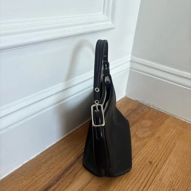 Coach Women's Bag - Black in black Leather from Depop, photo 1 of 1