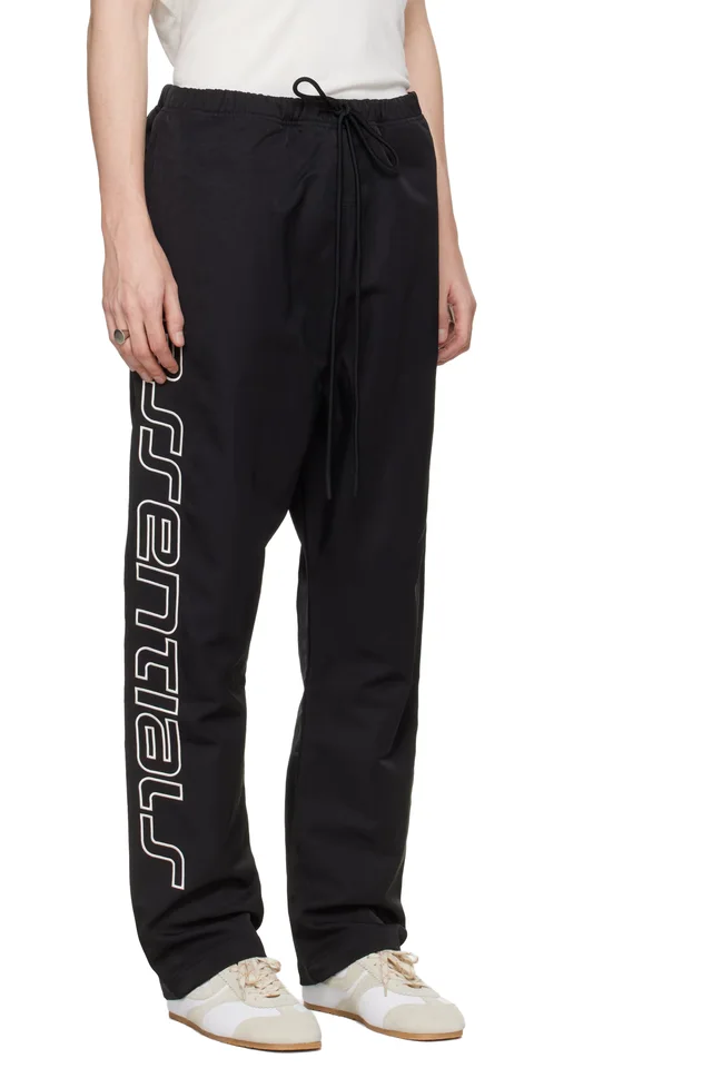 Fear of God ESSENTIALS Black Active Trace Relaxed Drawstring Track Pants, photo 2 of 4 from SSENSE