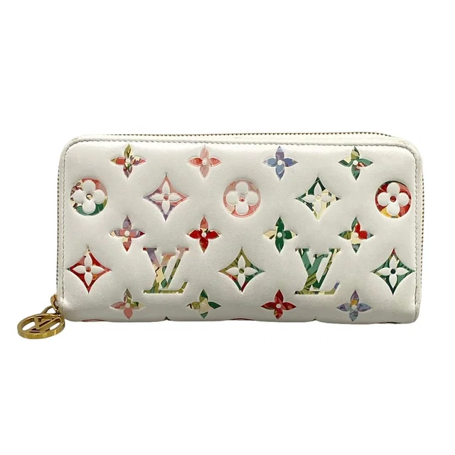 Louis Vuitton Wallet Cousin Zippy Blanc Leather in White Leather from The Reluxe