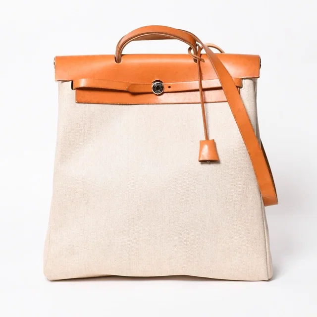 Hermès Herbag MM Toile H Box Calf Brown Beige Silver Handbag in Brown Box leather from The Reluxe