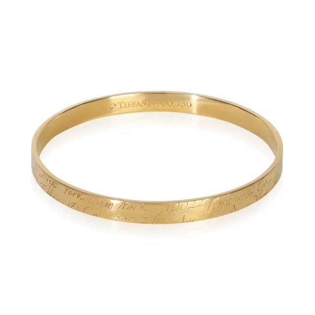 Tiffany & Co. Yellow Gold Notes Bangle Bracelet 18k in Yellow from HEWI