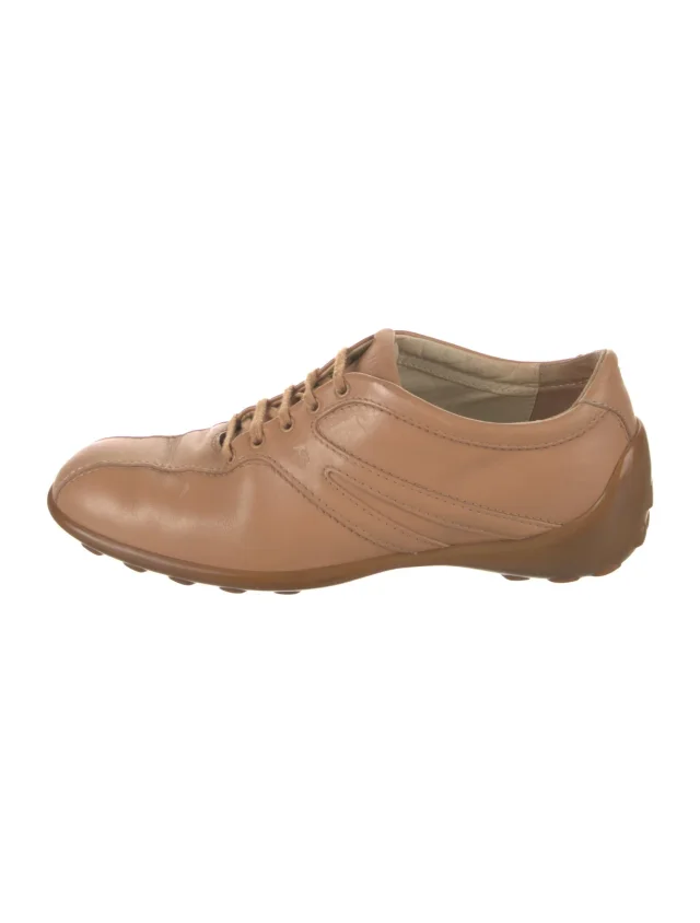 Tod's Leather Sneakers in Leather from The RealReal