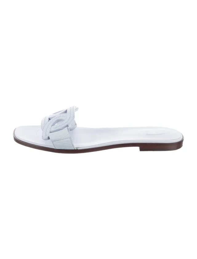 Tod's Leather Slides in blue Leather from The RealReal