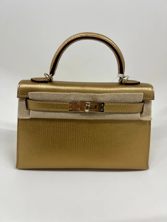 Limited Edition Hermes Mini Kelly Dore Gold PMBHW in Gold from Luxury Promise