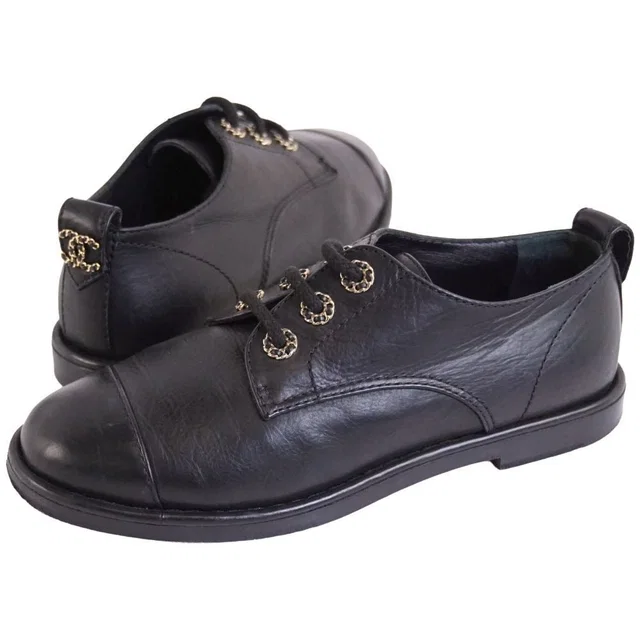 Chanel Sneakers Leather Shoes Davis Coco in Leather from The Reluxe