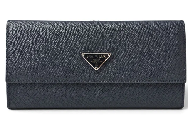 Prada Wallet Kiss Lock Saffiano Triangle Triang Baltico Navy in Navy Saffiano leather from The Reluxe