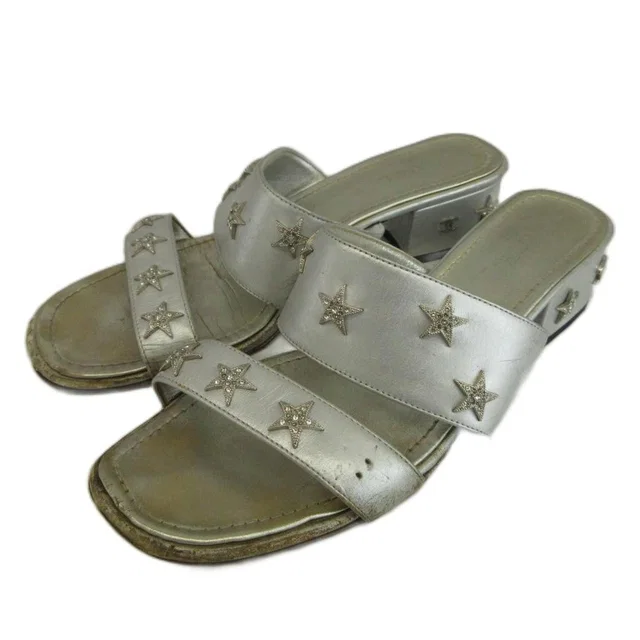 Chanel Sandals Leather Low Heels Star Studs Rhinestone CC Logo Silver in Silver Leather from The Reluxe