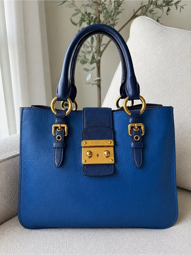 Miu Miu Two-Tone Blue Madras Leather Top Handle Satchel Tote Gold Lock Handbag in blue Leather from Poshmark