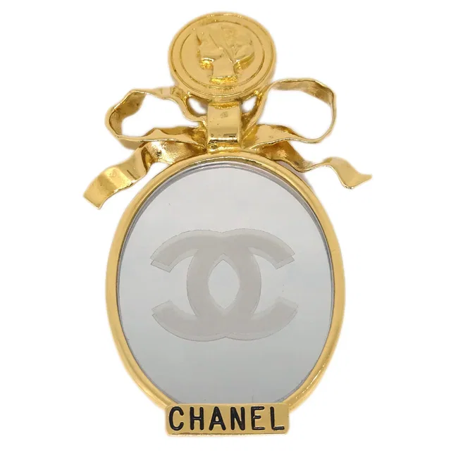 Chanel Bow Mirror Brooch Pin Gold in Gold from AMORE Vintage Tokyo