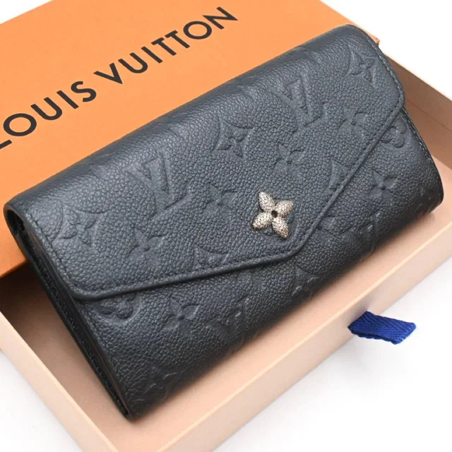 Louis Vuitton Empreinte Portefeuille Sarah Navy Limited Wallet in Navy Leather from The Reluxe