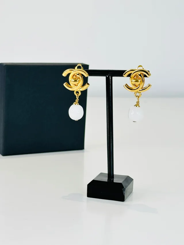 Chanel Gold Plated CC Turn Lock Clip-on Earrings in Gold from Edit Second Hand