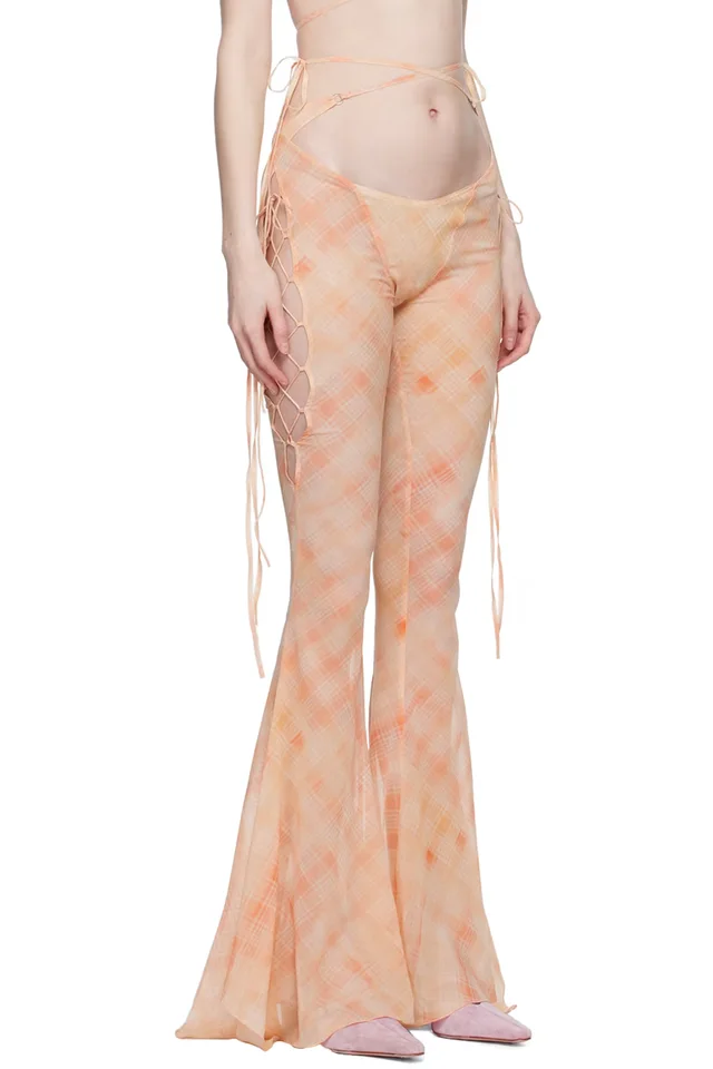 KNWLS Orange Glimmer Trousers, photo 2 of 4 from SSENSE