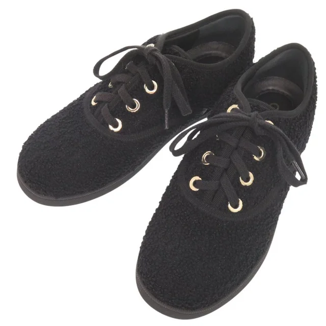 Chanel Logo Black Low-Cut Sneakers 37 in Black from The Reluxe