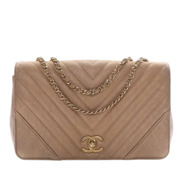 Gold Chanel Medium Chevron Iridescent Caviar Statement Flap Crossbody Bag in Gold Caviar leather from Designer Revival, photo 1 of 1