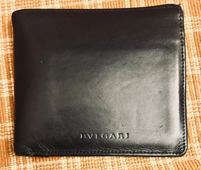 Bvlgari Leather Bifold Wallet With Coin Pocket in black Leather from Grailed