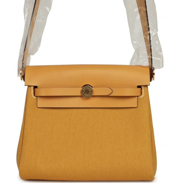 Hermès Herbag Zip 20 Mini Paille Toile Militaire Canvas, Vache Hunter Gold Hardware in Canvas from Madison Avenue Couture