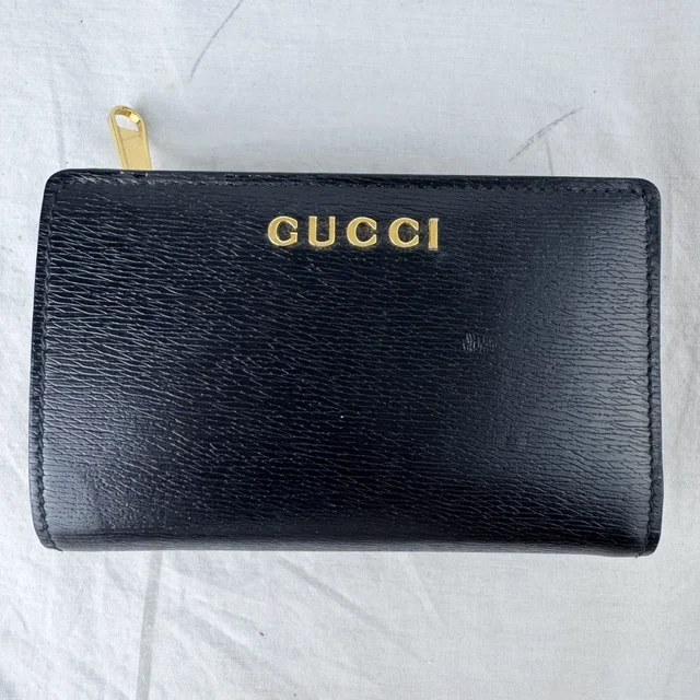 Gucci Script Bifold Black Leather Wallet from Reowned