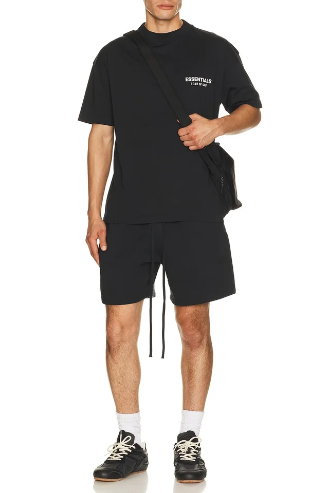 Fear of God ESSENTIALS Classic Fit T-Shirt Back Logo in Vintage Black, photo 3 of 4 from REVOLVE (Canada)