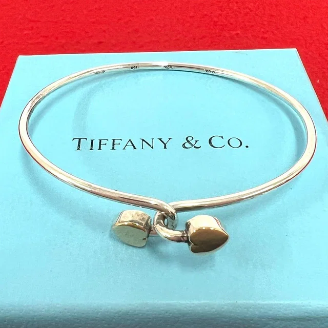 Tiffany & Co. Solid Double Heart Bracelet Silver Yellow Gold in Yellow from The Reluxe