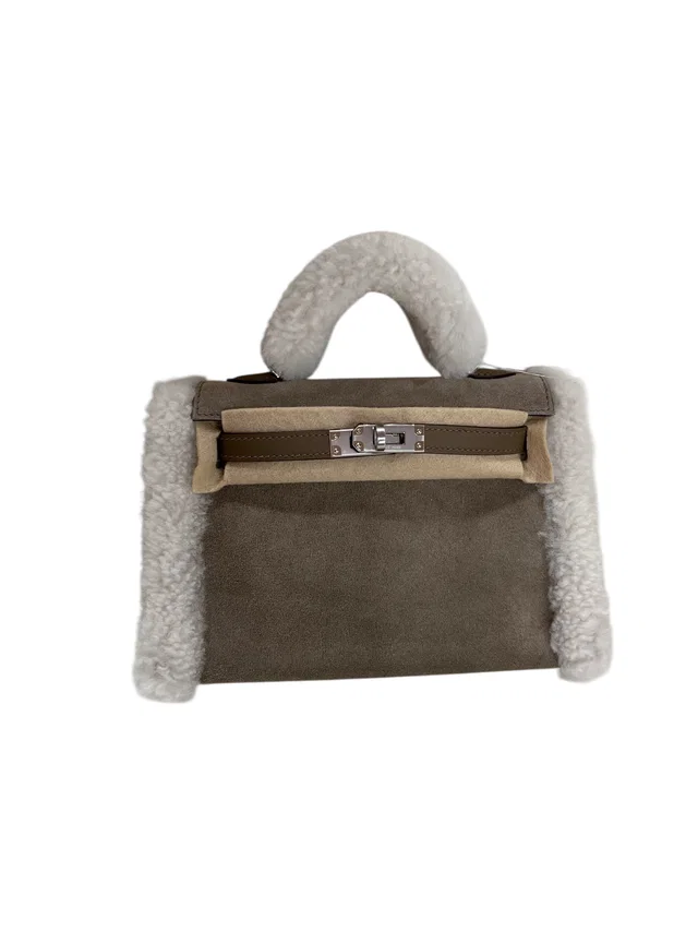 Hermès Kelly 20 Teddy Etoupe Grizzly / Merinos / Sheepskin / Swift PHW #K in Taupe Swift leather from Luxury Promise