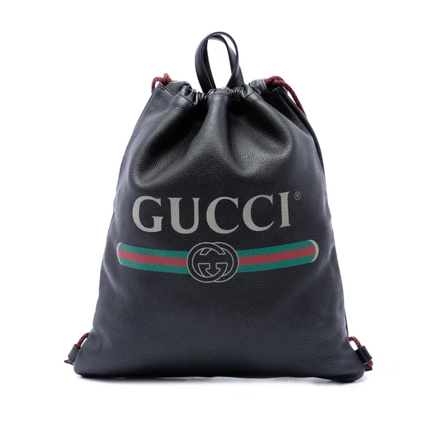 Black Gucci Grained Calfskin Web Logo Drawstring Backpack in Black Caviar leather from Designer Revival