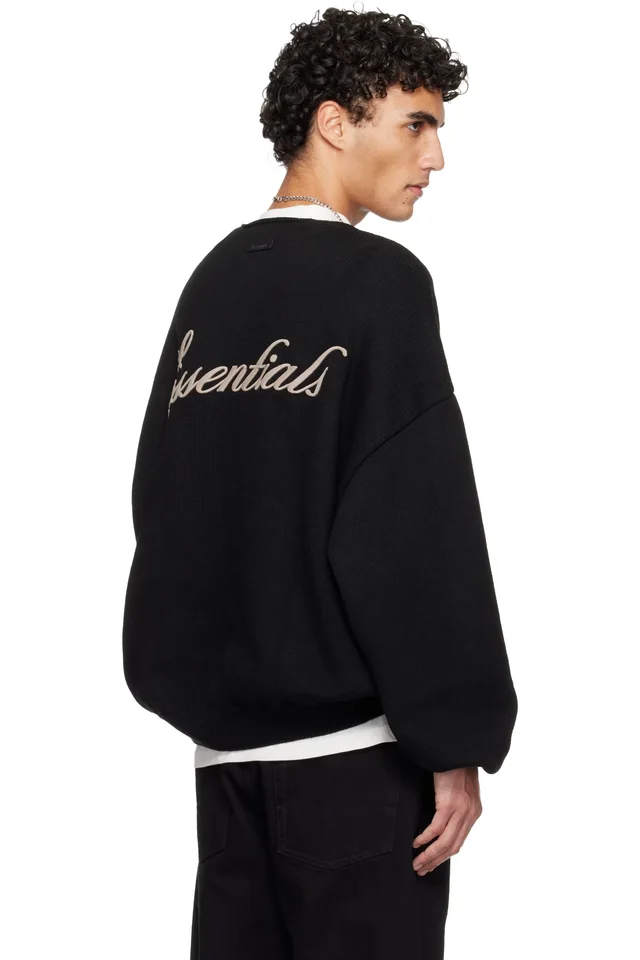 Fear of God ESSENTIALS Black Holiday Embroidered Merino Crewneck Sweater, photo 3 of 3 from SSENSE