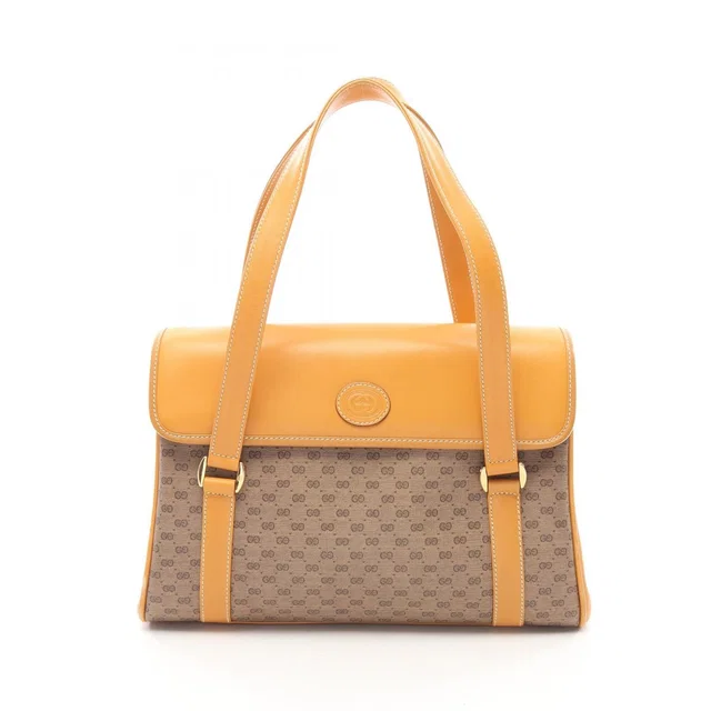 Gucci Tote Vintage Micro GG Brown Dark Hand Bag in Brown Coated canvas from The Reluxe
