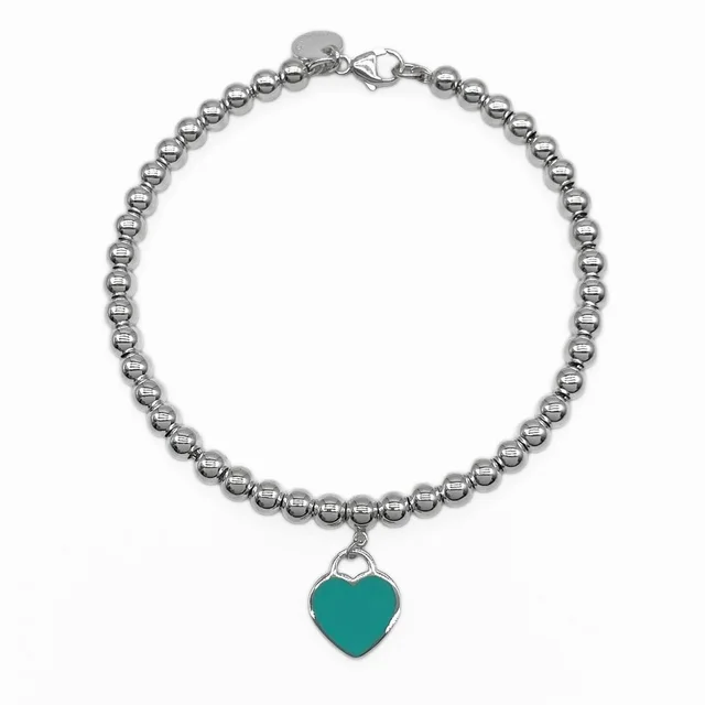 Tiffany & Co. Authentic Blue Heart Charm Bracelet in blue from Poshmark