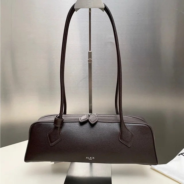 Alaïa Dark Brown Leather Shoulder Bag in brown|red Leather from Poshmark, photo 1 of 1